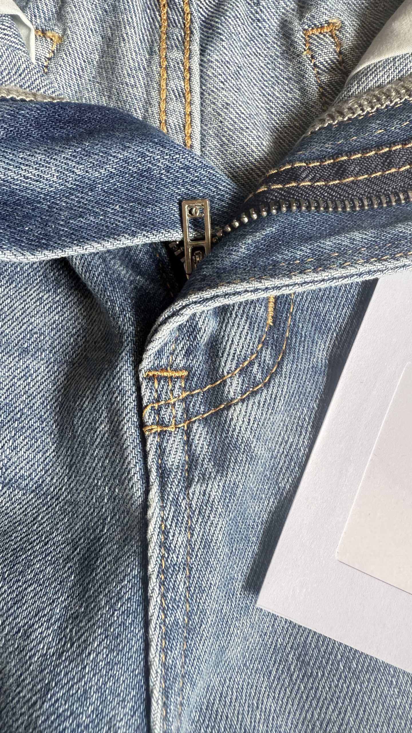 CC 25 Cross-stitched double C high-waisted straight-leg jeans