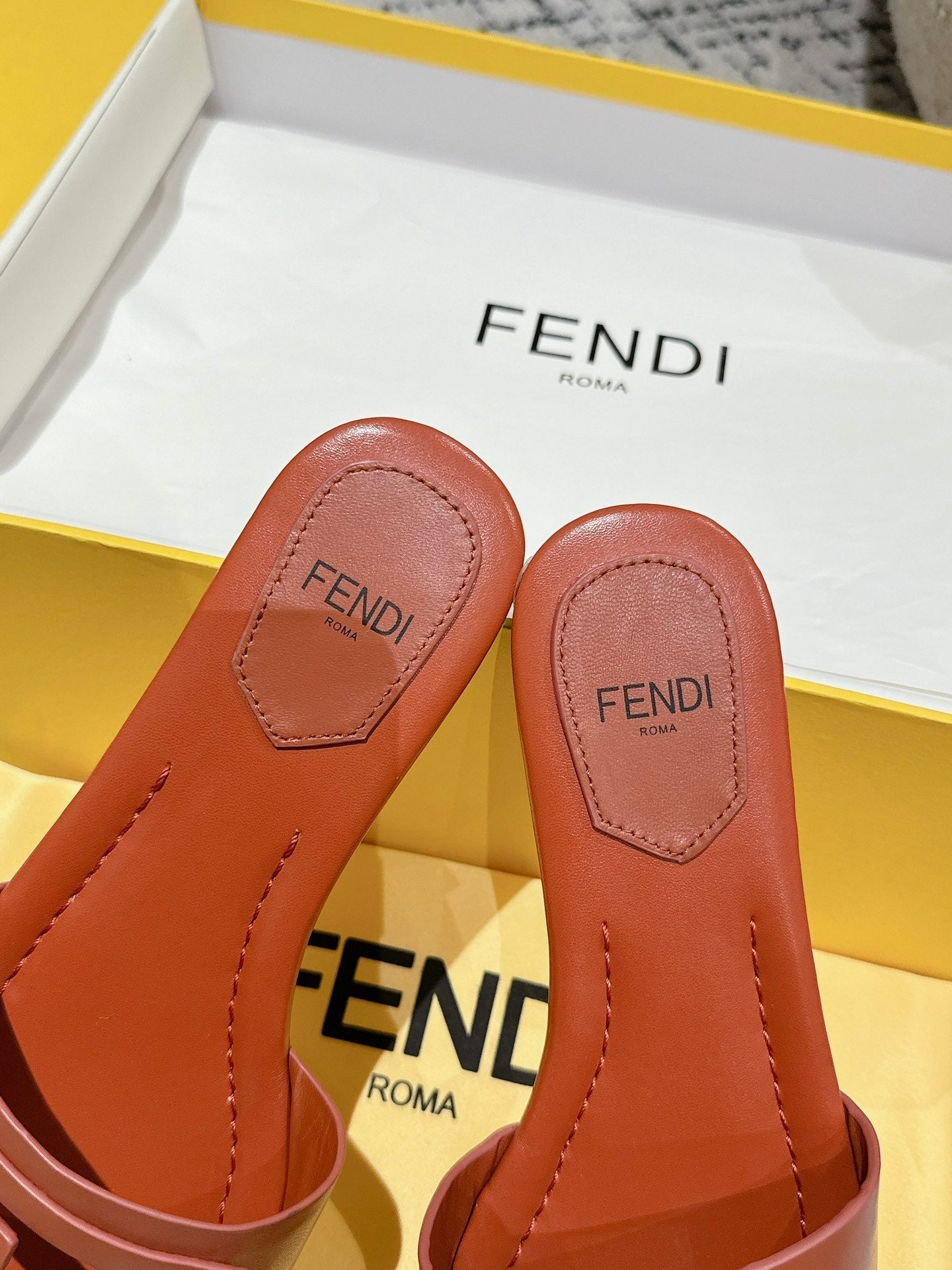 FF Baguette Rust Leather Slide