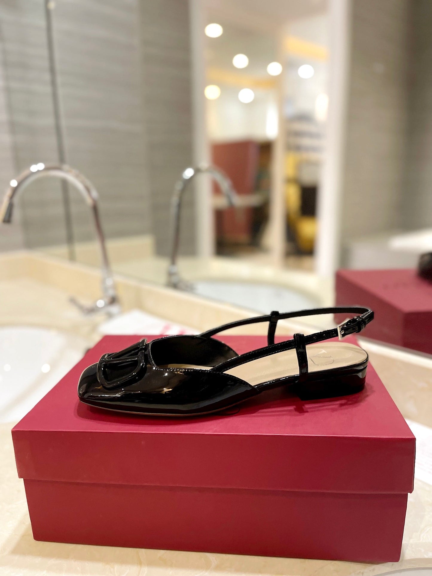 VLOGO BLACK PATENT LEATHER SLINGBACK FLATS