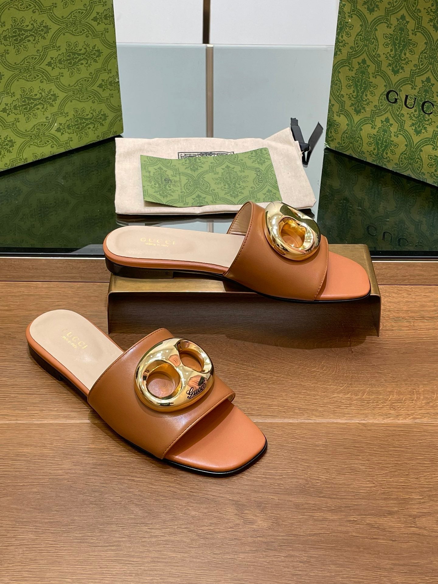 FLAT MULE IN BRONE BROWN CALFSKIN