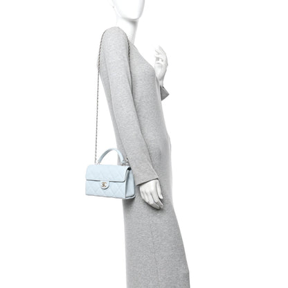 Caviar Quilted Mini Retro Twist Top Handle Flap Light Blue