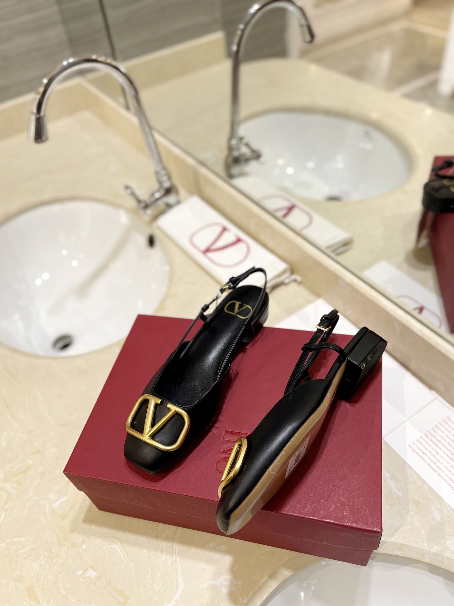 VLOGO BLACK LEATHER SLINGBACK FLATS