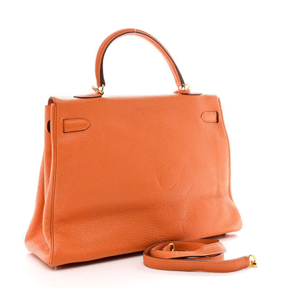 Togo Kelly Retourne 35 Orange